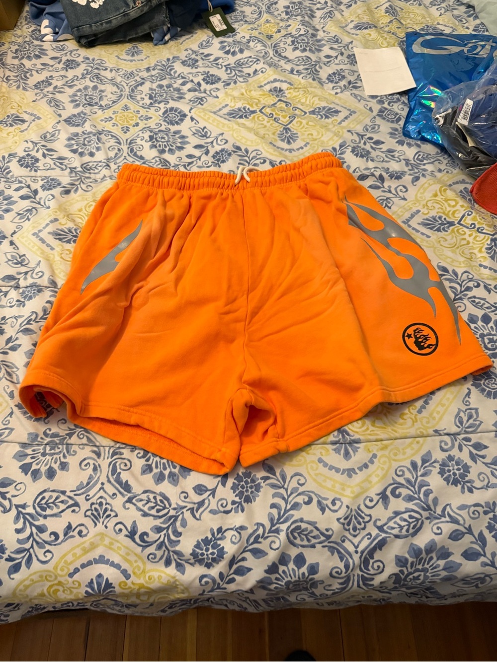 Hellstar Men's Bright Orange Athletic Shorts with Reflective Flame Accent